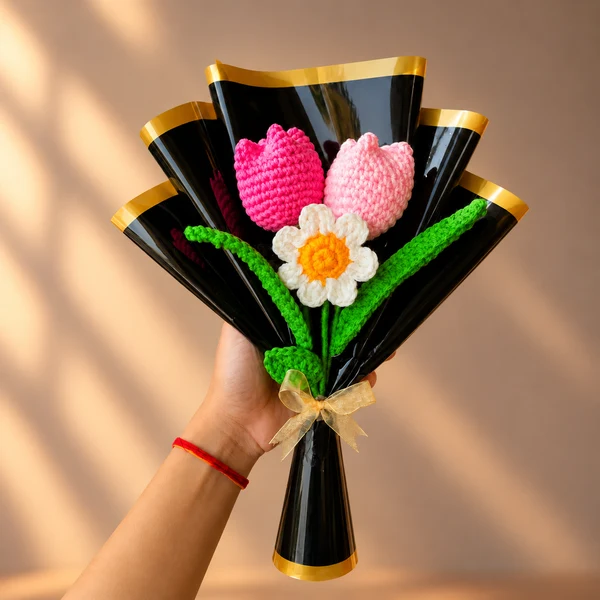 Crochet bouquet of two pink tulips and a white daisy